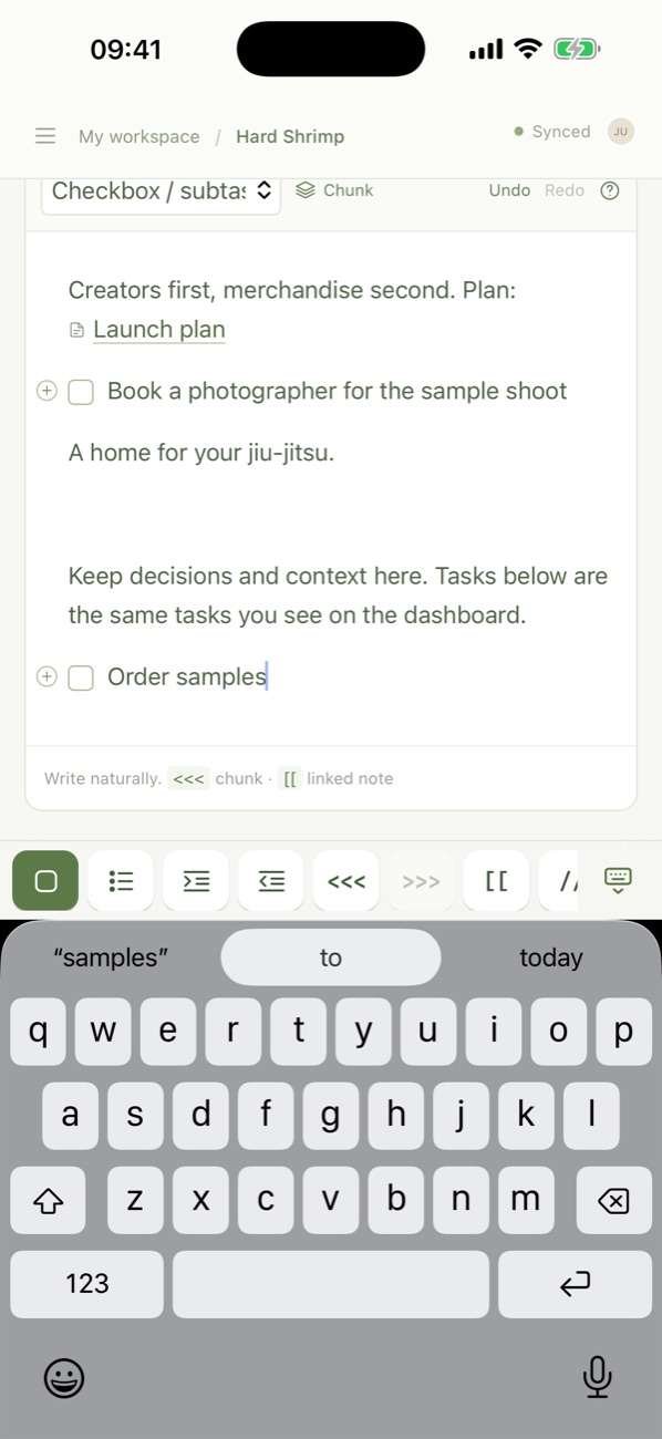 A note being written on iPhone, with tasks such as Order samples, and a formatting bar above the keyboard.